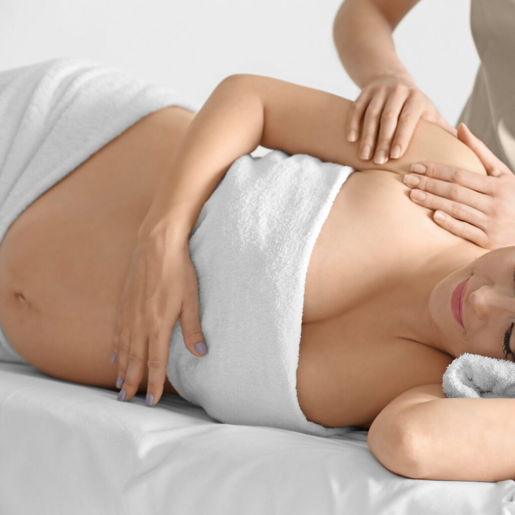 Massage therapist performing Craniosacral Therapy